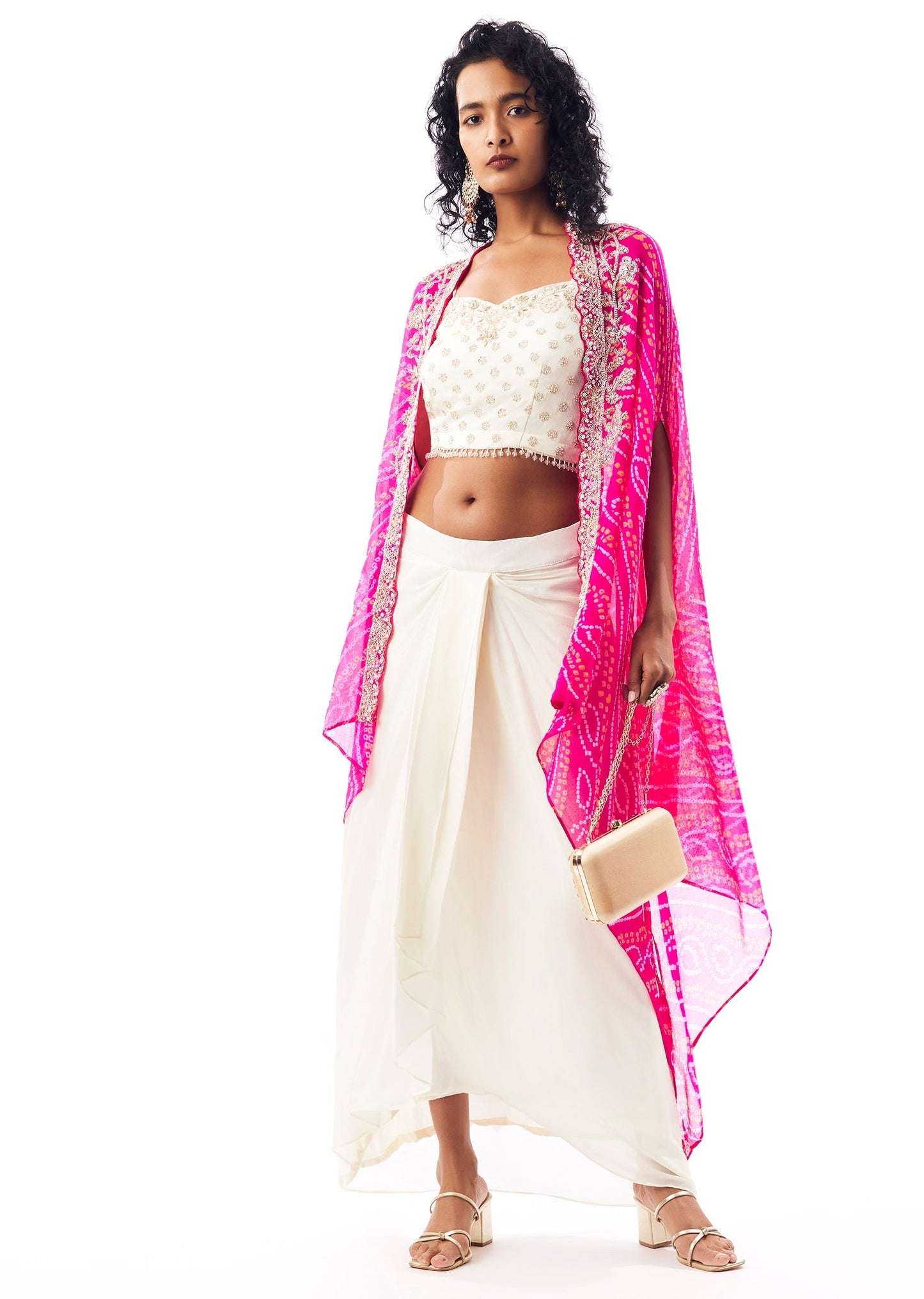 Vibrant Bandhani Festive Couple Set – Bandhani Cape Skirt Set For Her And Pink Silk Tie-Dye Kurta Jacket Set For Him