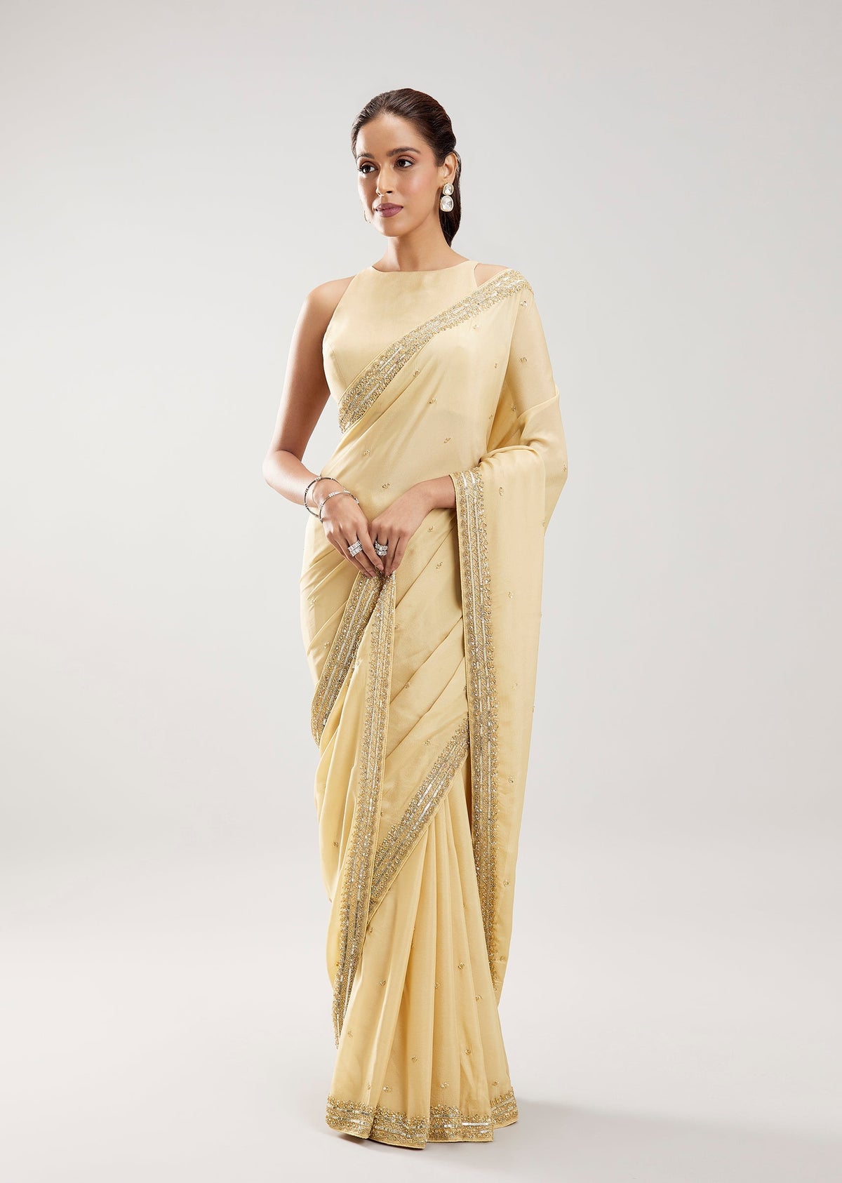 Ivory Chinon Saree With Cut Dana Embellished Border And Pallu
