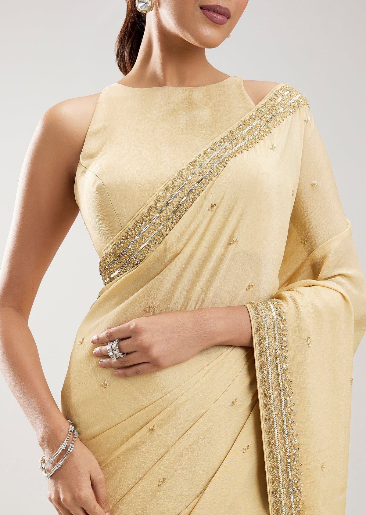 Ivory Chinon Saree With Cut Dana Embellished Border And Pallu