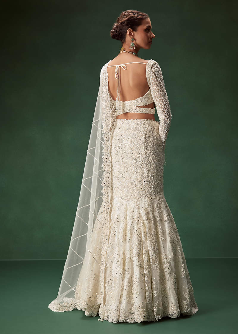 Ivory Mermaid Bridal Lehenga With Full Sleeves And Heavy Embroidery