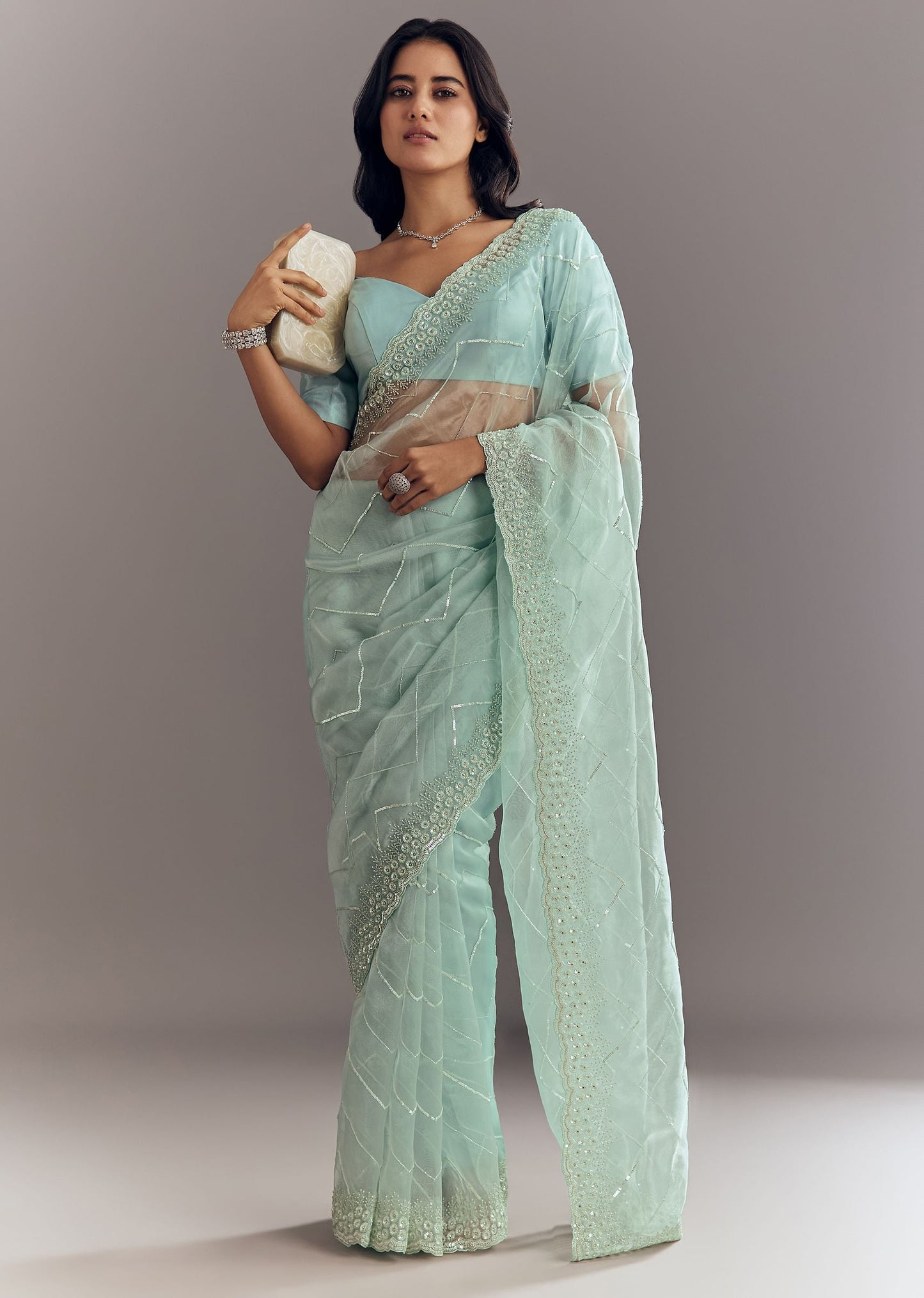 Light Blue Glass Tissue Saree With Stone Embroidery And Scallop Border