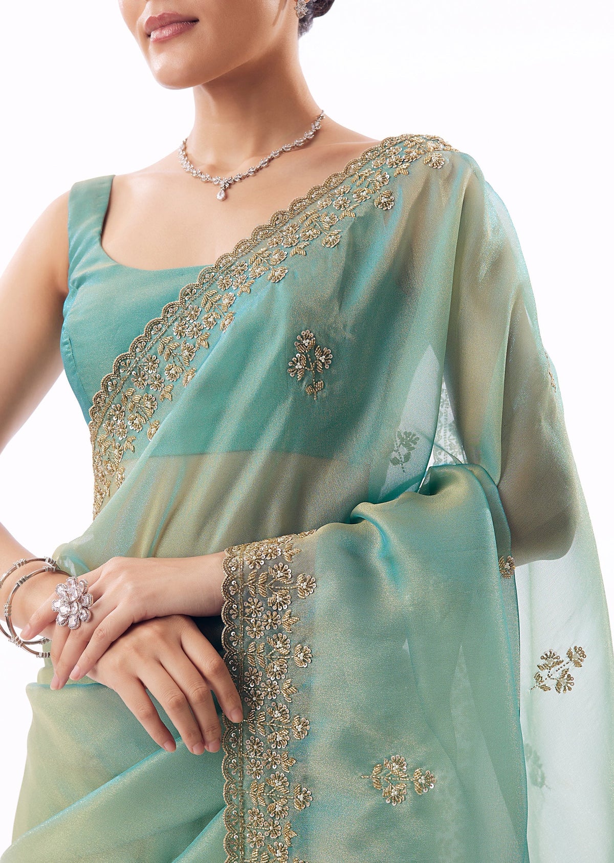 Light Turquoise Blue Tissue Saree And Cutdana Sequin Bead Embroidered Borders
