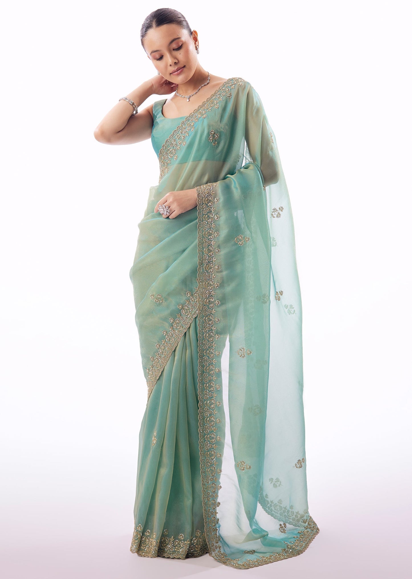 Light Turquoise Blue Tissue Saree And Cutdana Sequin Bead Embroidered Borders