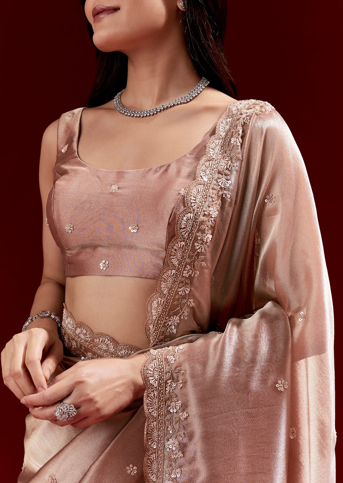 Peach Tissue Saree With Scalloped Embroidered Border And Buttis