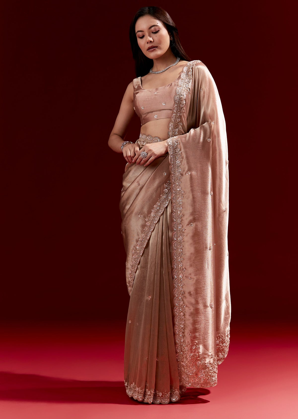 Peach Tissue Saree With Scalloped Embroidered Border And Buttis