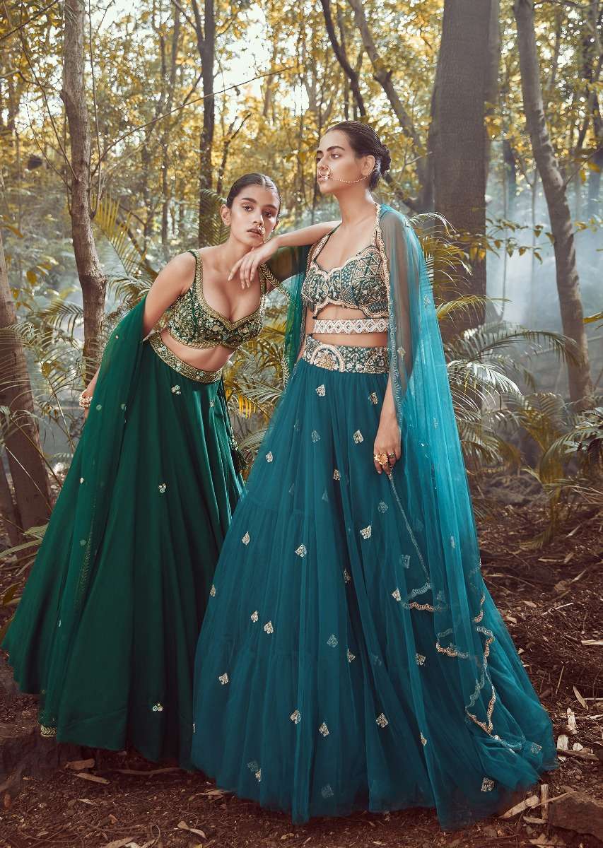 Srushti Porey In Pine Green Lehenga Choli In Raw Silk With Butti Work And Heavy Hand Embroidery In Mughal Motifs On The Choli