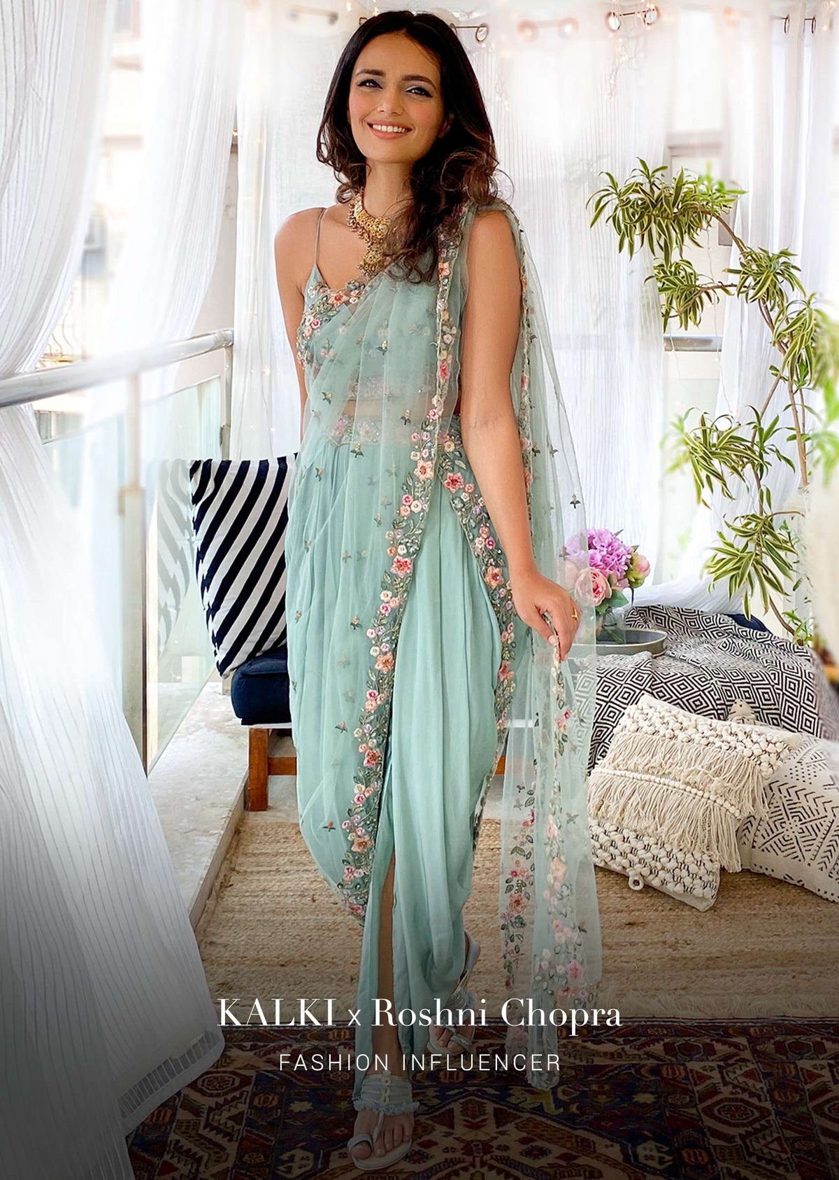 Roshni Chopra In Sage Green Dhoti Suit With A Raw Silk Crop Top Adorned Using Vibrant Resham Embroidered Summer Blooms