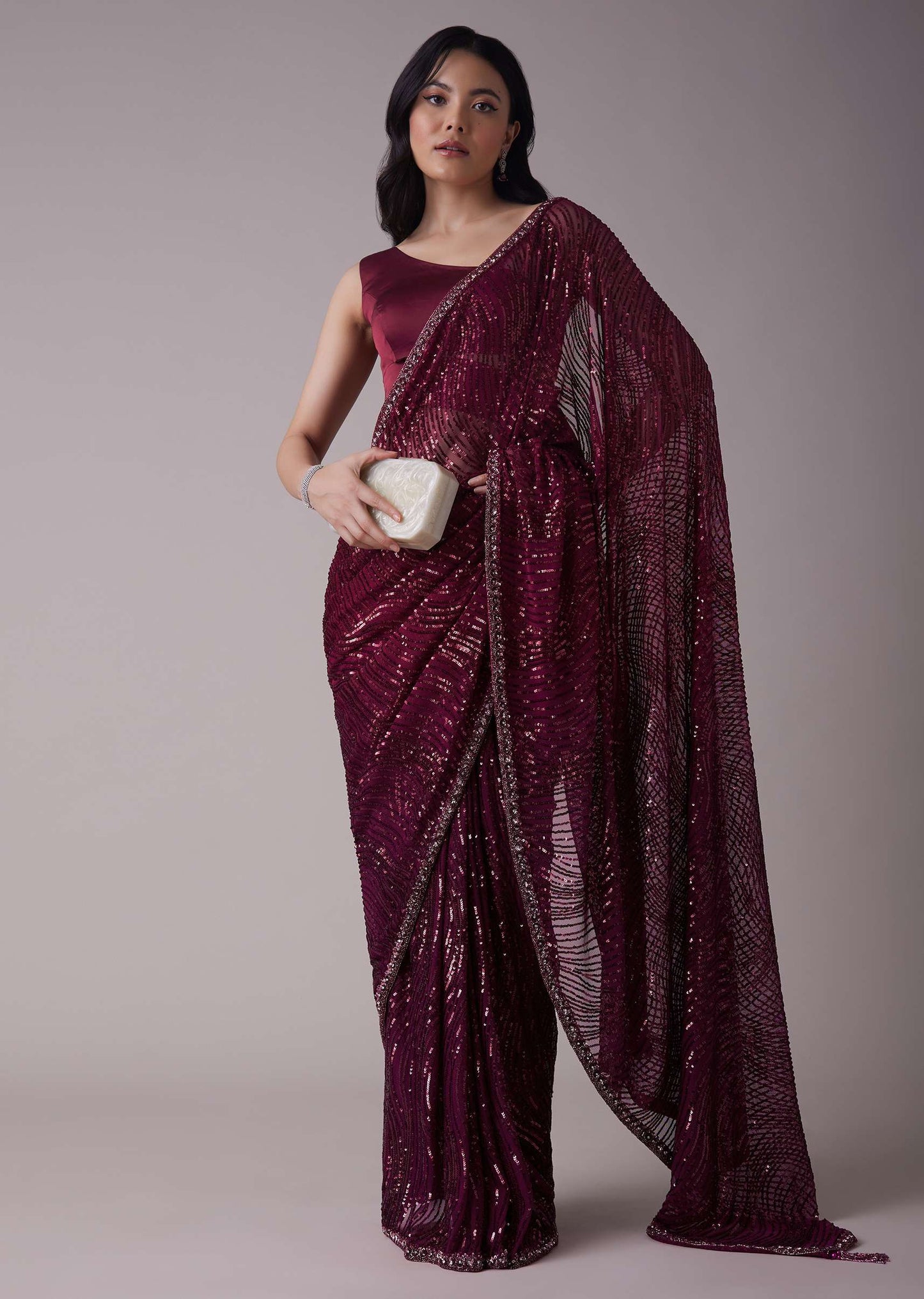 Wine Sequins Saree With An Embellished Border